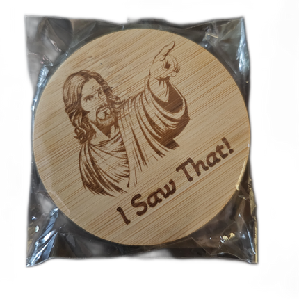 Round wooden bottle opener with engraved image Jesus pointing and saying 'I Saw That!' in clear packaging.